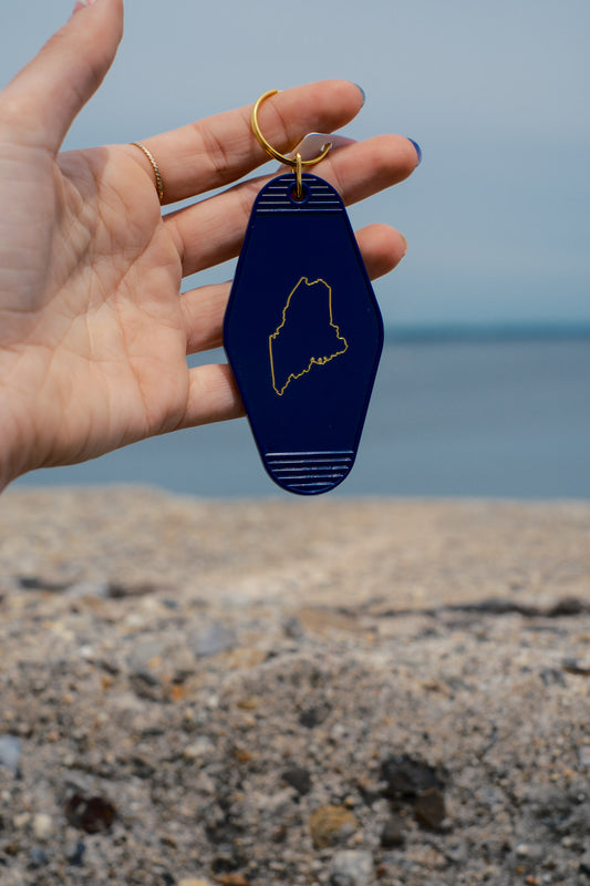 embossed gold maine navy acrylic motel keychain