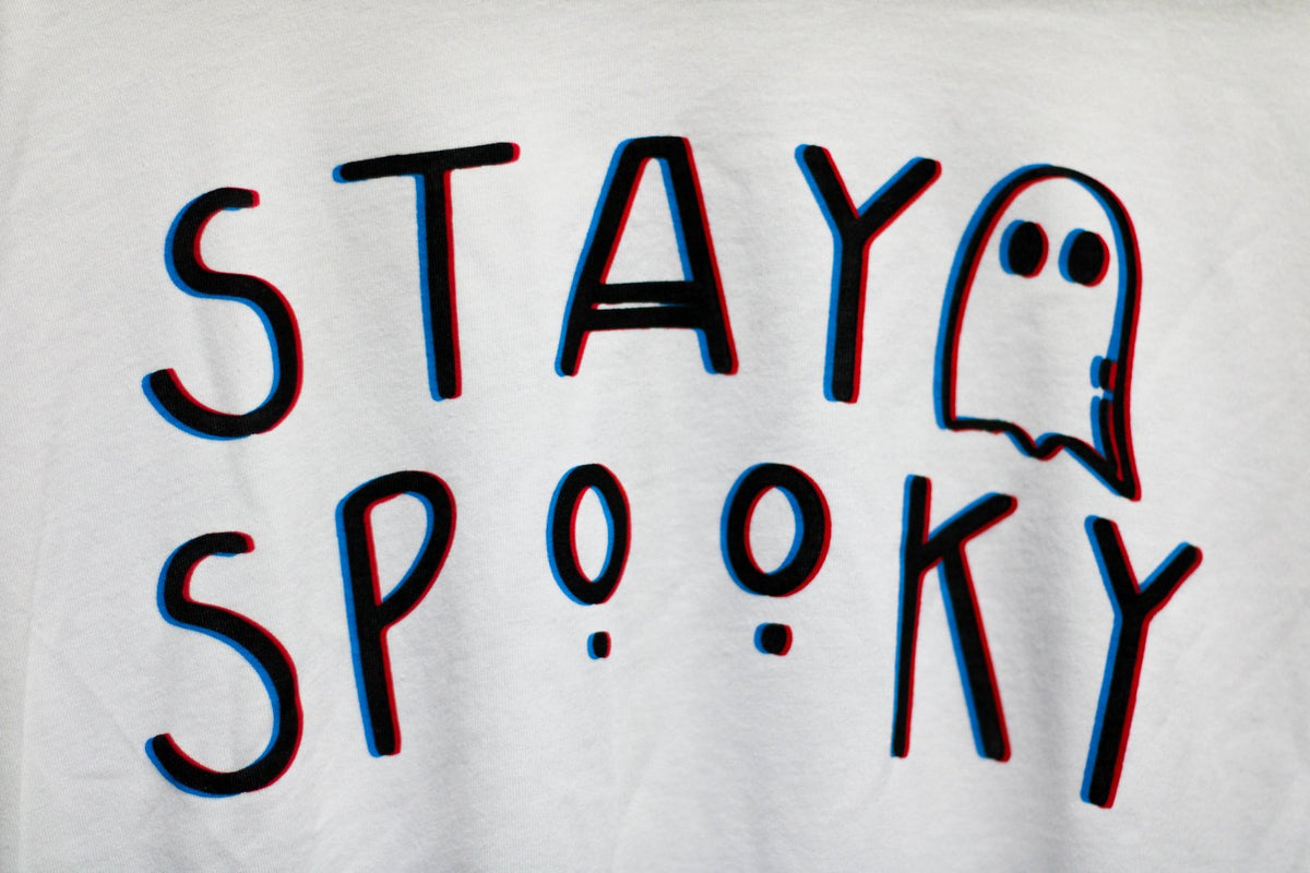 A 'Stay Spooky' graphic in blue, black, and red to create a 3D effect with a ghost.